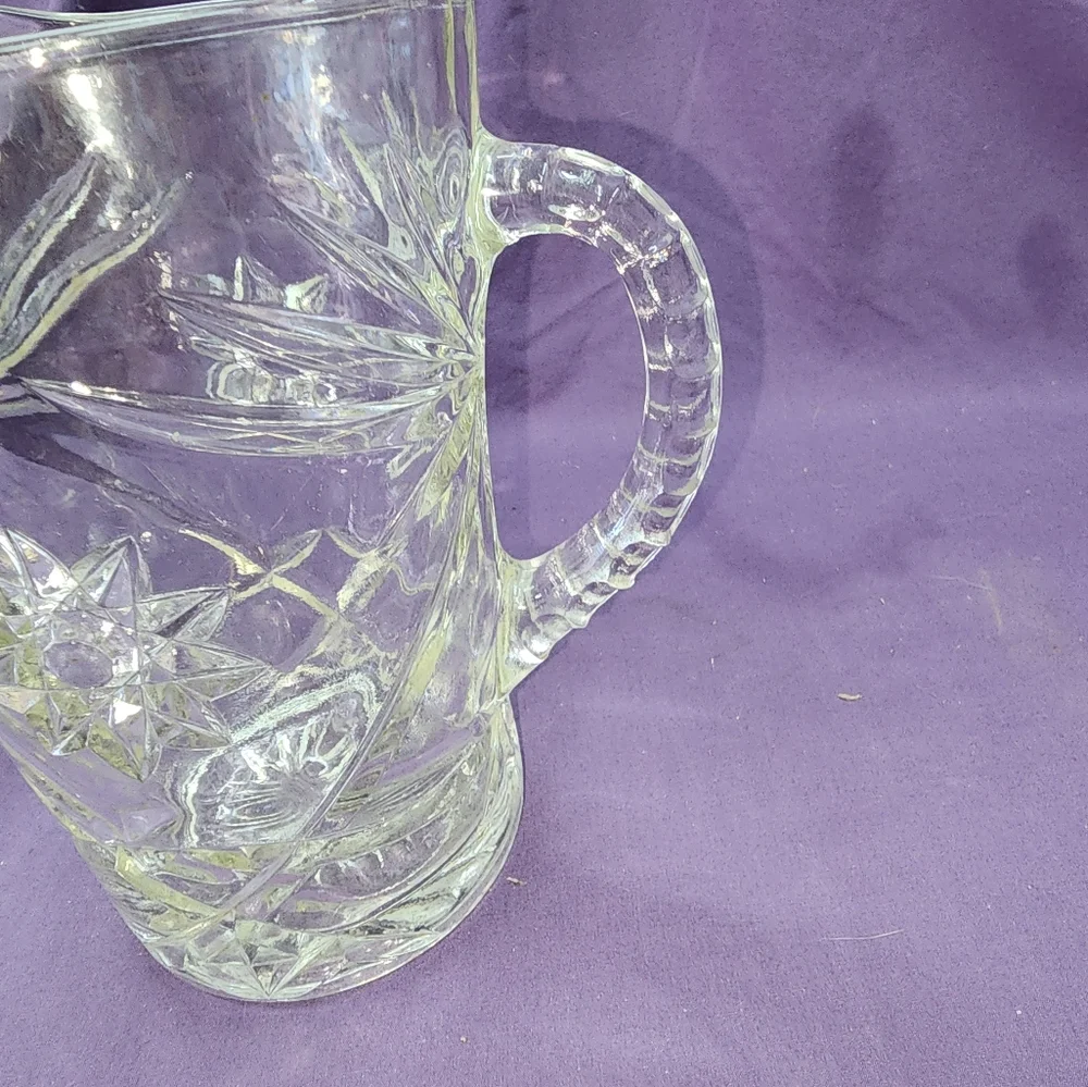 Vintage Pitcher Embossed with Sun and Floral design - Picture 2 of 5